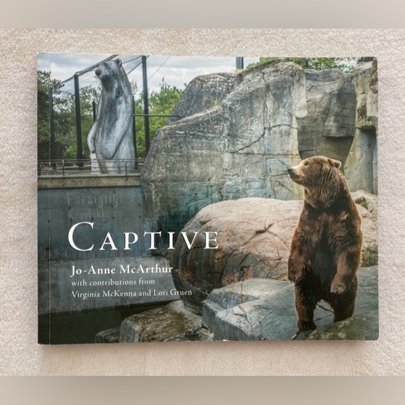 Other - SIGNED Captive animal hardcover book by photojournalist Jo-Anne McArthur